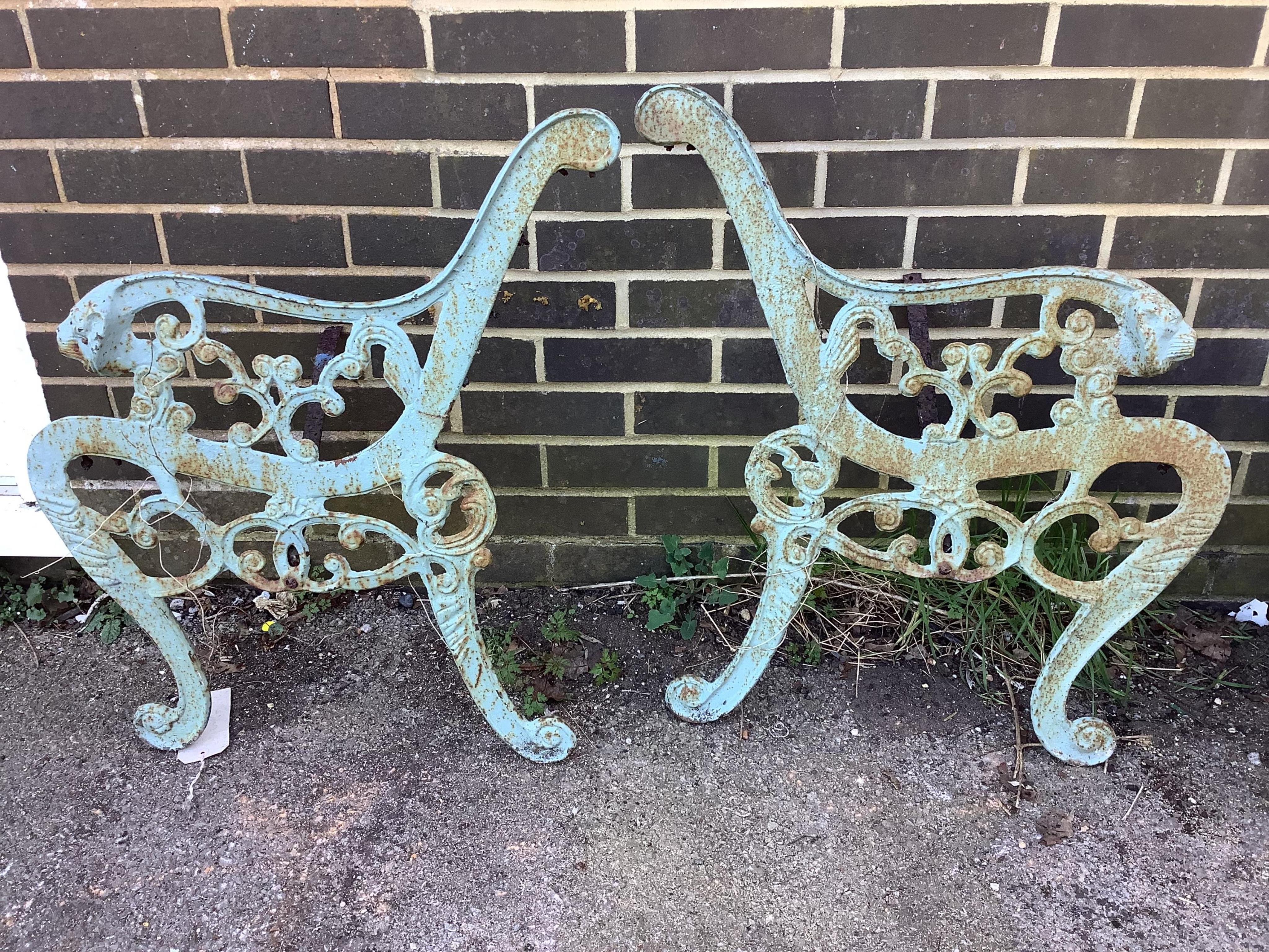 A metal garden bench, width 130cm, depth 45cm, height 87cm together with a pair of bench ends. Condition - fair